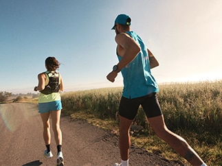 Two runners on a road